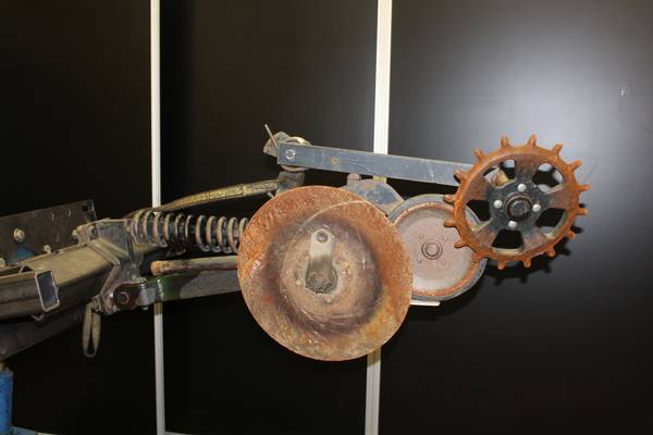 John Deere row unit with extreme corrosion and rust before restoration